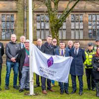 A group photo of attendees at the Glossop ✡️ Holocaust Memorial Day 2023 ✡️ flag raising